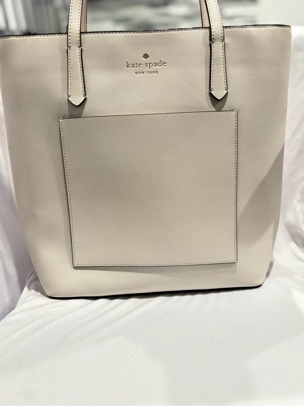 kate spade cream saffiano tote with front pocket